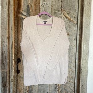 Eddie Bauer Women’s Large crème colored lighter weight v-neck sweater.